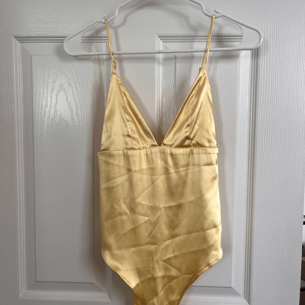 Yellow silk bodysuit